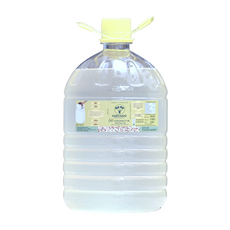 Large bottle of coconut oil with a label on a white background | Cold Pressed Coconut Oil | Sarvaani | Tiptur Copra
