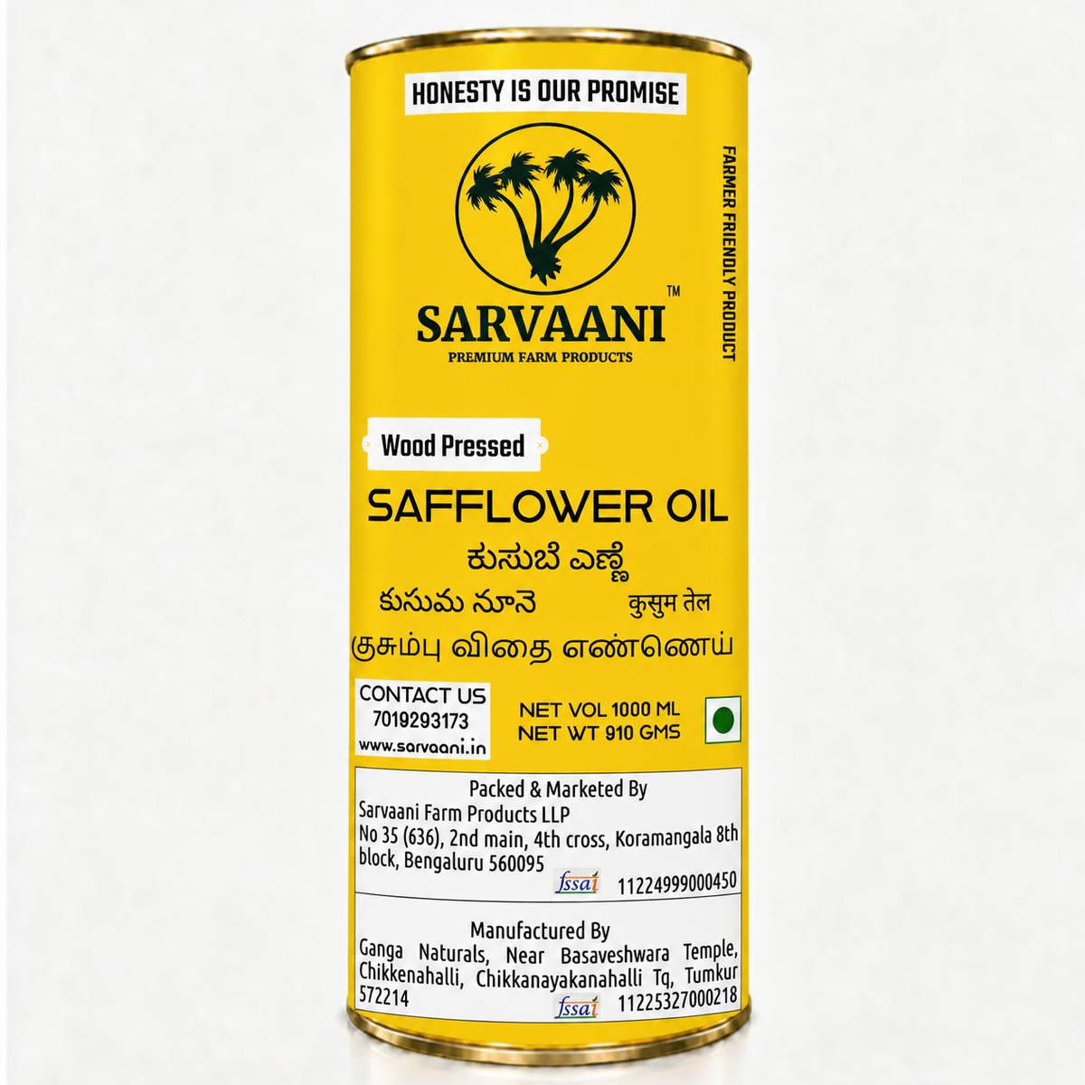 A tall cylindrical yellow tin of Sarvaani Safflower Oil, wood pressed, with black text and logo, photographed against a plain white background.