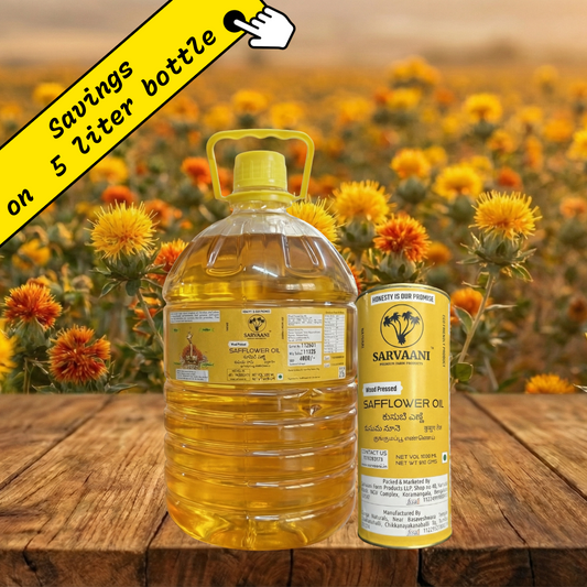 Two bottles of Sarvaani Safflower Oil with a field of sunflowers in the background.